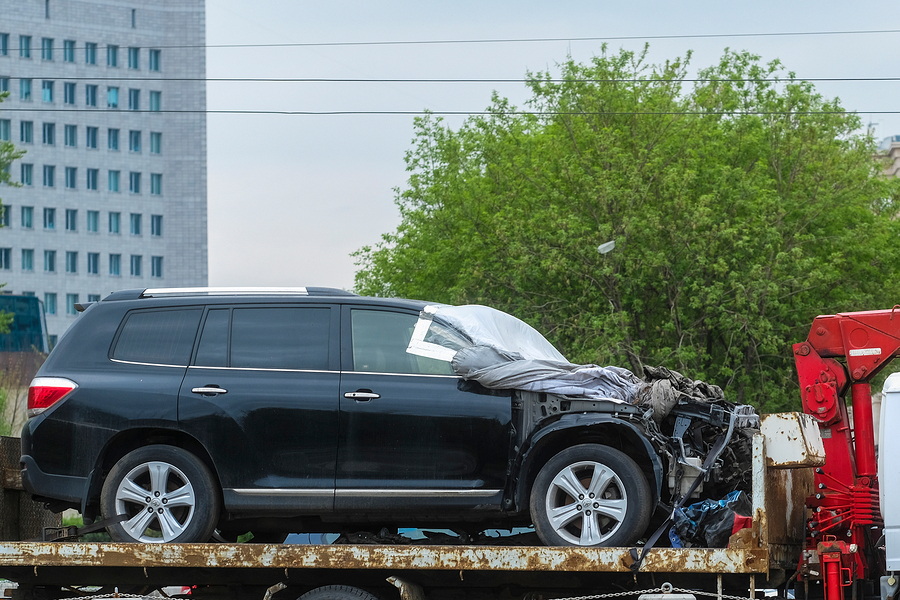Moscow, Russia - May, 6, 2018: the image of the tow truck carrying the broken car